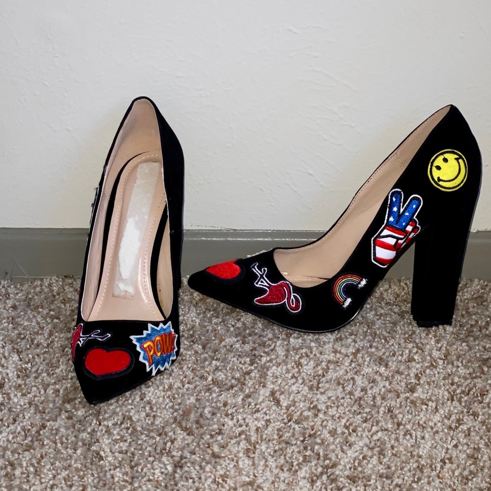Black patchwork pumps